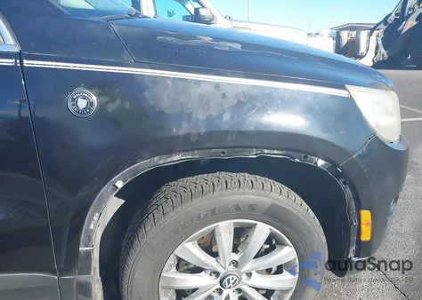 2011 Volkswagen Tiguan Sel z USA, uszkodzony, nr VIN WVGAV7AX5BW510883